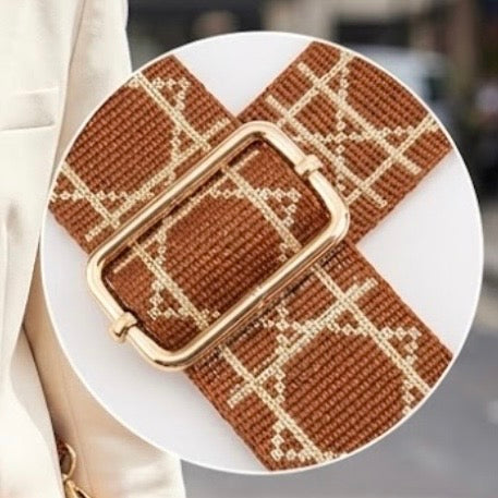 TIKORI LONDON checkered lines tan crossbody strap laid flat showing pattern and adjustable length. Golden hardware showing in a close up detail picture.