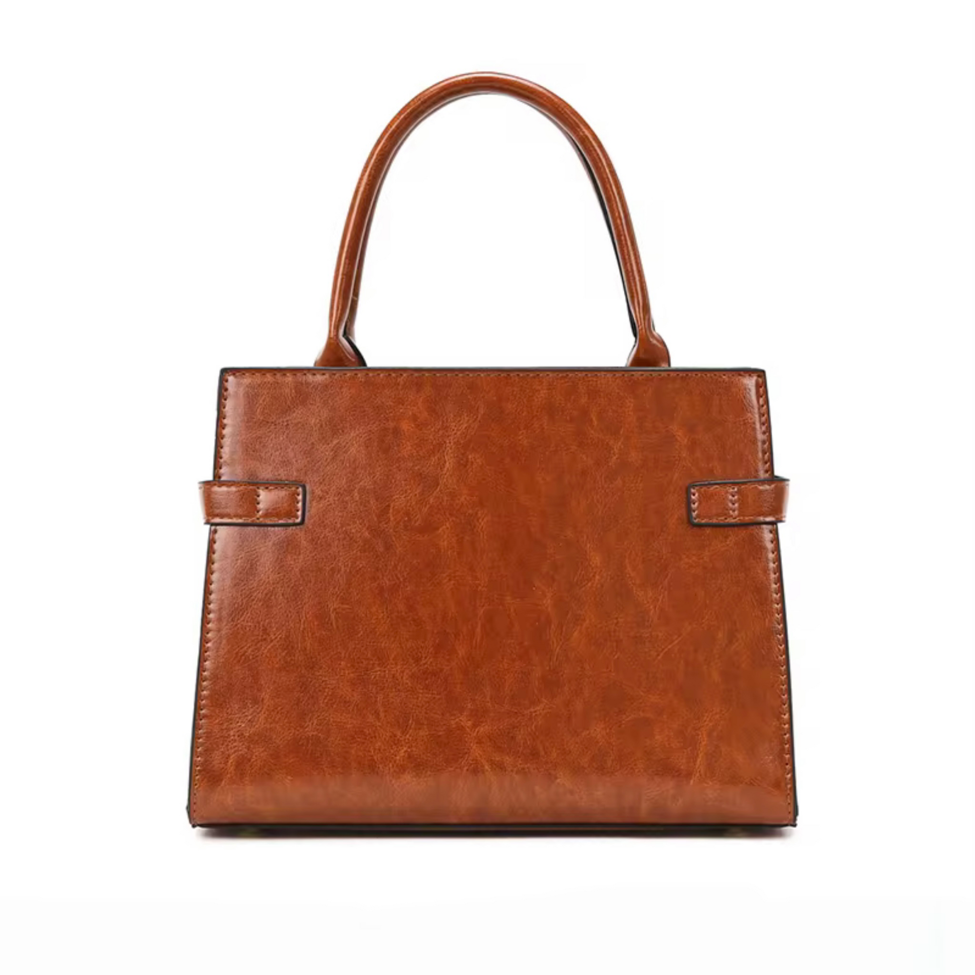Terra embossed carryall tote tan by TIKORI LONDON. The upper half featured a smooth polished texture, while the lower half features a luxurious, deep embossed reptilian texture for a high contrast in premium high quality Vegan Leather. bags back profile showing in the picture in a fully white background 