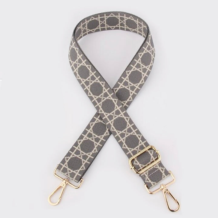 Grey  Tikori London Checkered Lines Crossbody Strap with adjustable length laid and stylish pattern displayed. Golden hardware also showing in the picture in a white background.