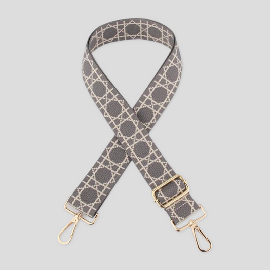 Grey  Tikori London Checkered Lines Crossbody Strap with adjustable length laid and stylish pattern displayed. Golden hardware also showing in the picture in a white background.