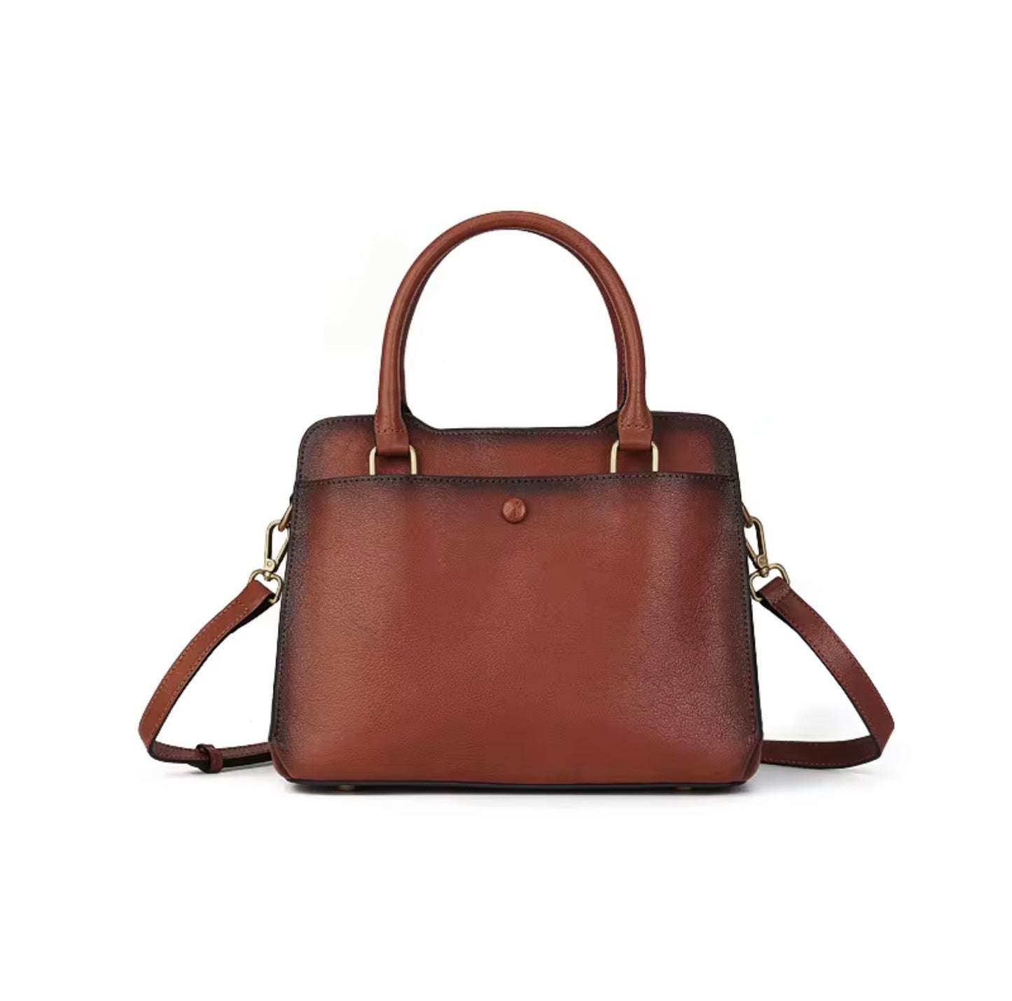 Heritage Burnished Leather Tote - Deep mahogany by TIKORI LONDON. Each piece features a signature hand burnished finish. This artisanal technique creates a rich, multi tonal gradient, a deep mahogany patina that evolves and grows more beautiful with every year of use. Front profile of the bag in white background. 