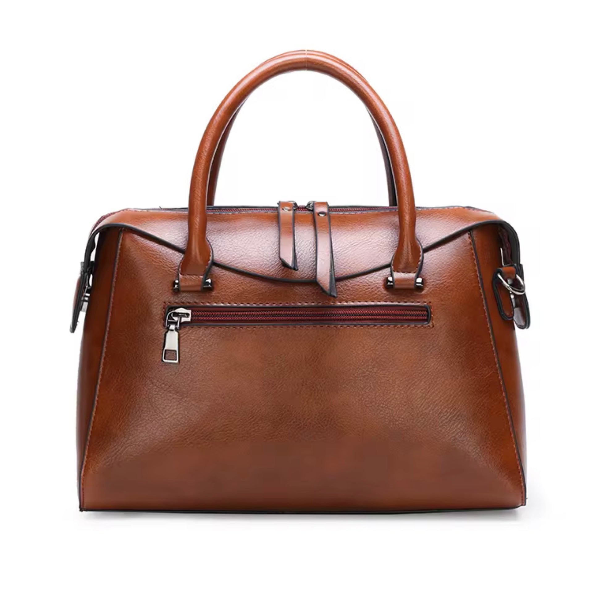 Vintage Inspired Embossed Satchel Bag tan by TIKORI LONDON. This elegant top handle handbag is crafted from rich, deep coffee toned high quality premium Vegan Leather, featuring a sophisticated crocodile embossed panel across the front for a multi textured look. Its structured "doctor bag" silhouette offers a spacious interior, secured by a smooth top zipper . Back profile of the bag showing in the picture. Back pocket details and curved top handle shows in fully white background.