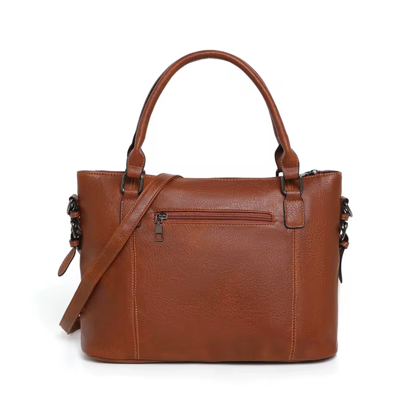 Maven  Satchel - Warm Brown by TIKORI LONDON. Back profile  of the bag showing with gun metal hardware in a fully white background. Back zipper details and strap shows in the picture. Constructed from deep-brown, pebbled Vintage washed Faux Leather with a supple hand-feel, the Marvin Satchel is as resilient as it is refined.