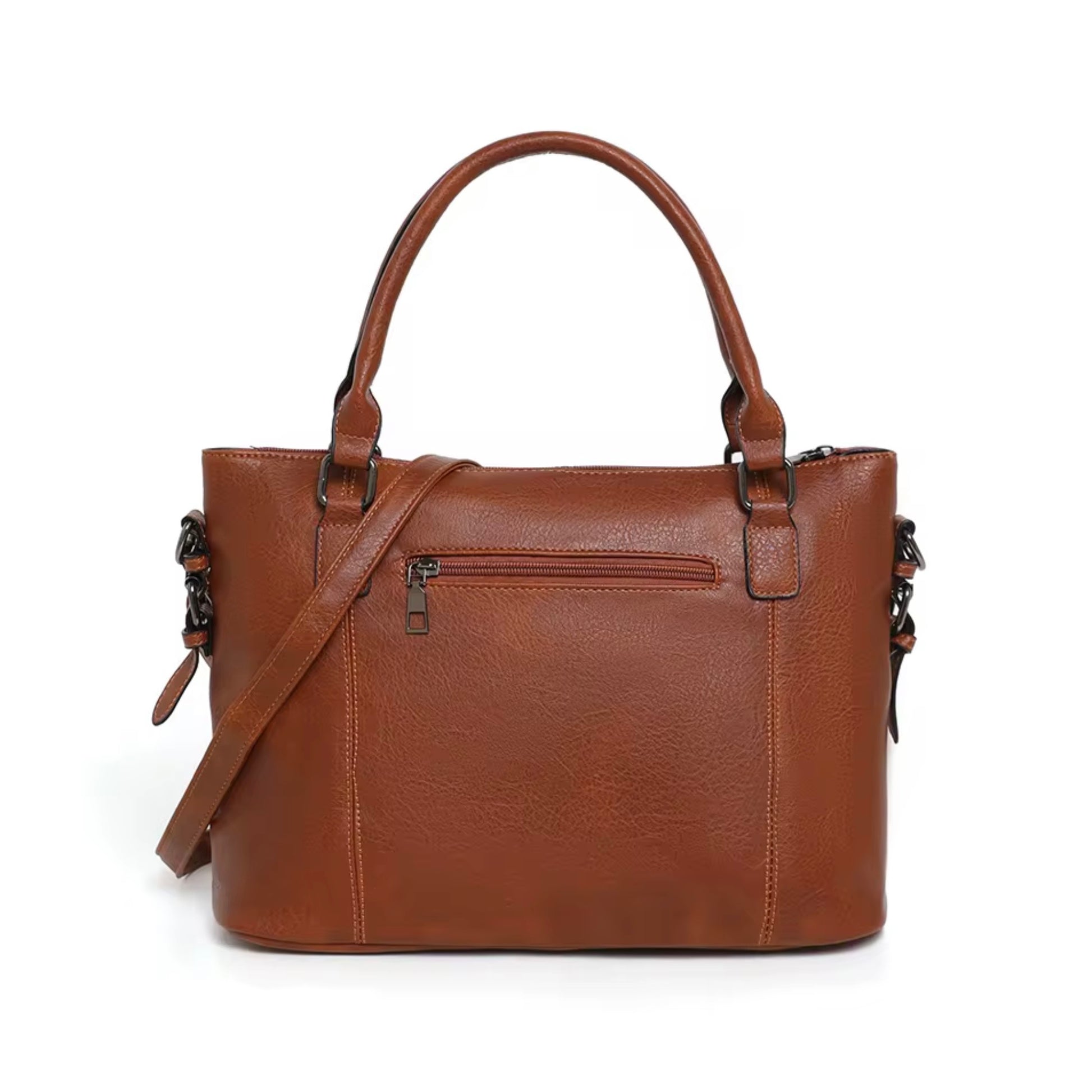 Maven  Satchel - Warm Brown by TIKORI LONDON. Back profile  of the bag showing with gun metal hardware in a fully white background. Back zipper details and strap shows in the picture. Constructed from deep-brown, pebbled Vintage washed Faux Leather with a supple hand-feel, the Marvin Satchel is as resilient as it is refined.
