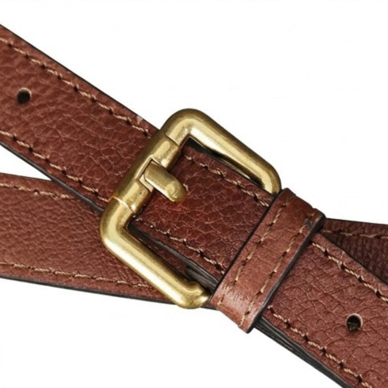 Heritage Burnished Leather Tote - Deep Mahogany By TIKORI london. Close up features of the Bag strap shown on the picture with golden tone buckle. 