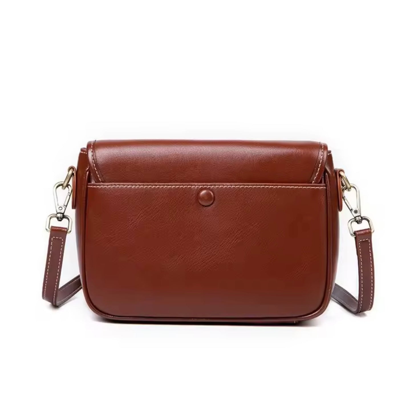 Heritage Cross Body Bag - Mahogany by Tikori London. Bag features a rich mahogany tone and back profile of the bag in white background seen on the picture  Brass hardware and long strap included.