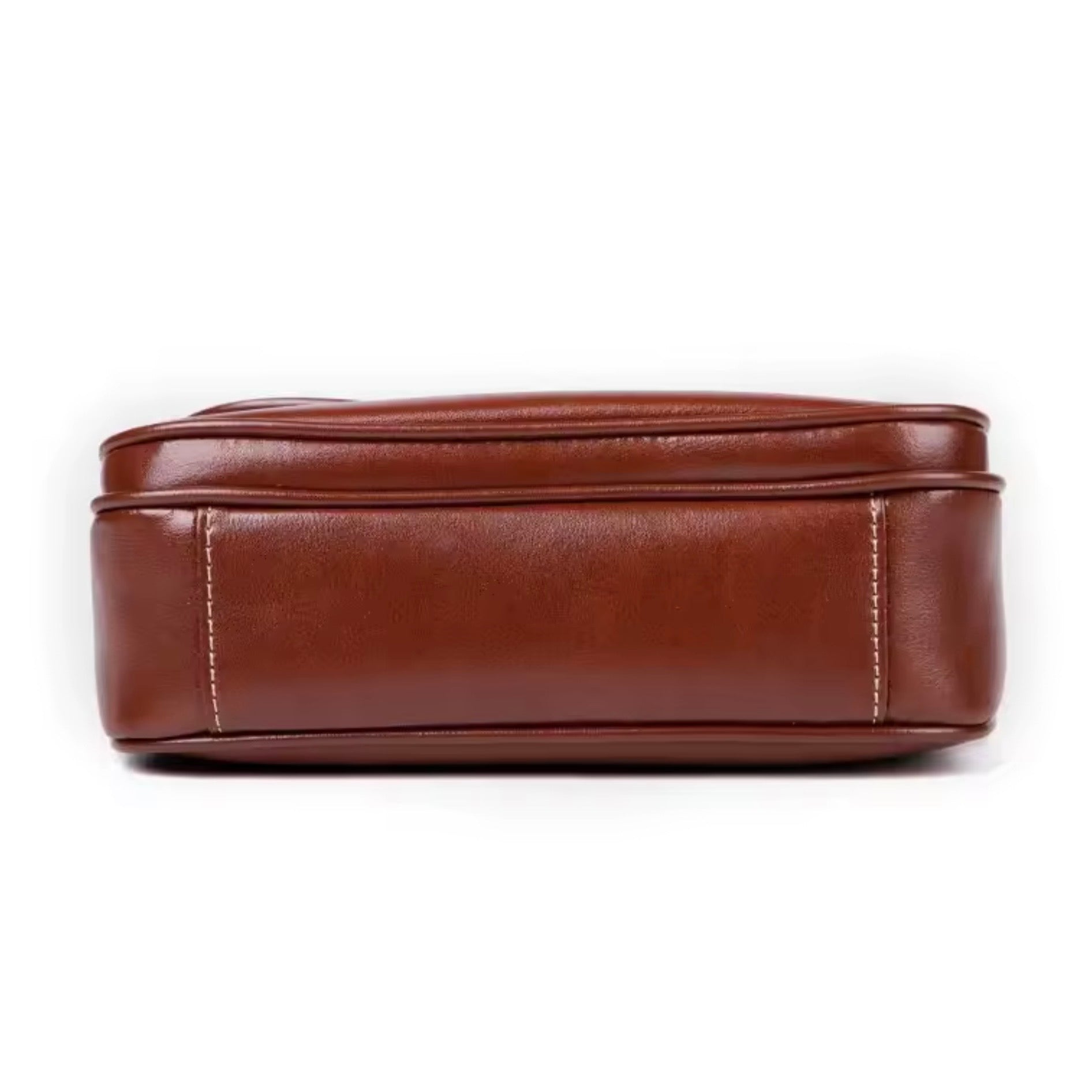 Heritage Cross Body Bag - Mahogany By TIKORI London. Bottom of the bag shows in the picture. 