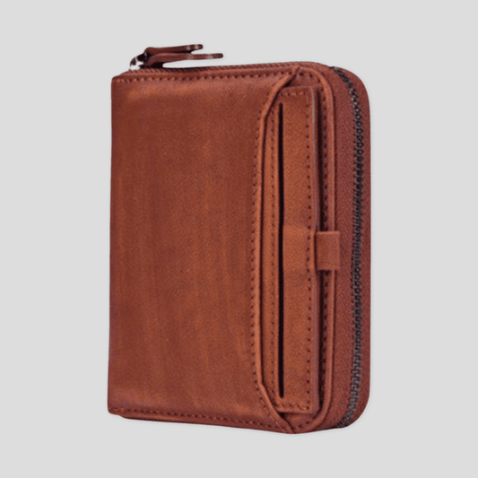 Light brown Tikori London short box wallet with sleek design and compact style, featuring multiple card slots and a smooth finish. Front of the wallet.