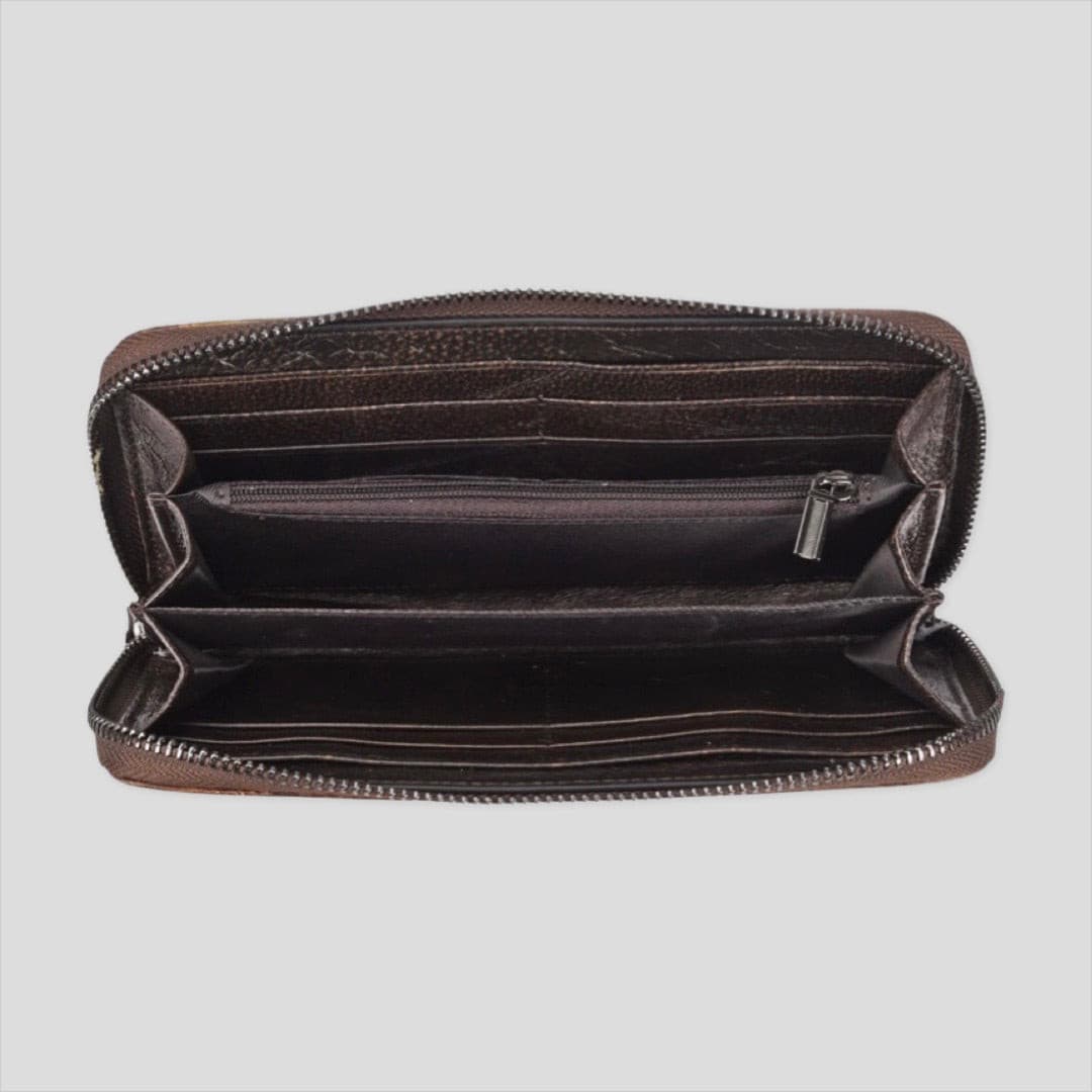 Orange and brown wrist strap wallet by Tikori London, featuring a compact design with a secure strap and minimalist style.