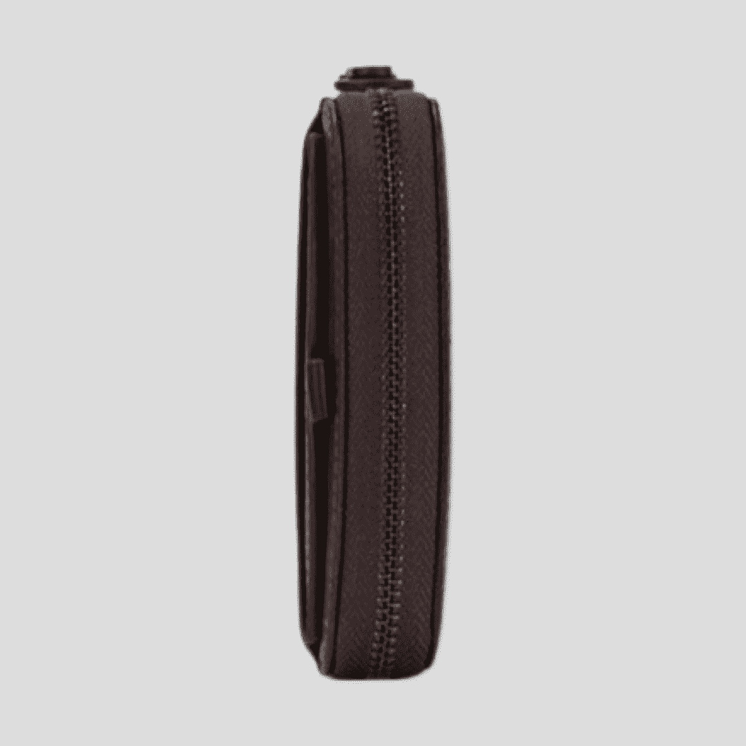 Dark brown Tikori London short box wallet with sleek leather design and compact size, ideal for everyday use. Side of the wallet.