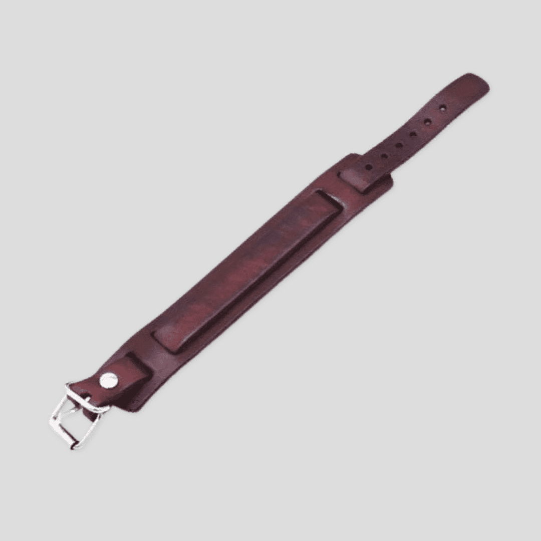 Dark brown leather layered bracelet by Tikori London featuring multiple leather straps and subtle silver metal accents.